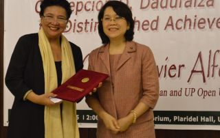 UPOU Chancellor Grace Alfonso recognized for her achievements and contribution as teacher and practitioner of mass communications and leader in open and distance learning.