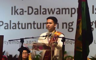 Mr. Ericson Peñalba, the top graduate of the Masters in Development Communication (MDC) from the Faculty of Information and Communication Studies (FICS), delivering his valedictory adress during the UPOU 21st Commencement Excercises.