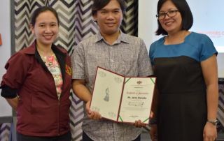 Dr. Serrano (R) and Ms. Canas-Llamas (L) present Mr. Donato a certificate as one of the resource speakers of the workshop.