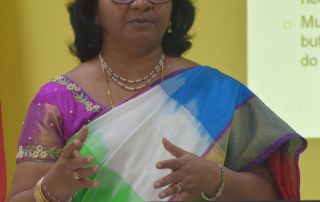 Dr. Pushpa presenting her exit report.