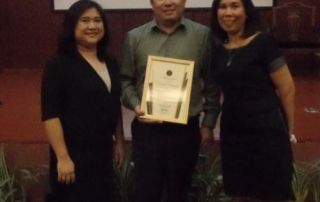 (L-R) The TDP project staff members Luisa A. Gelisan, Michael P. Lagaya, and Rhonna Marie Vereña, received the award on behalf of UPOU Chancellor Melinda dP. Bandalaria, TDP's Project Leader. (Photo from Liza Gelisan's Facebook Page)