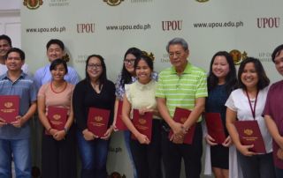 UP Professor Emeritus Felix Librero (in striped poloshirt) and Mr. Jerry Donato (rightmost), UPOUAFI President, flanked by participants of the 2nd FICS Masterclass on Communication Contagion.