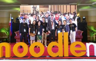 UPOU delegates pose with Dr.Martin Dougiamas, the CEO and Founder of Moodle