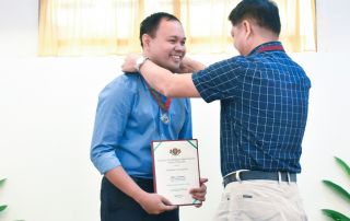Billy A. Danday receives recognition for leading the A.Y. 2017–2018 UPOU FEd graduates