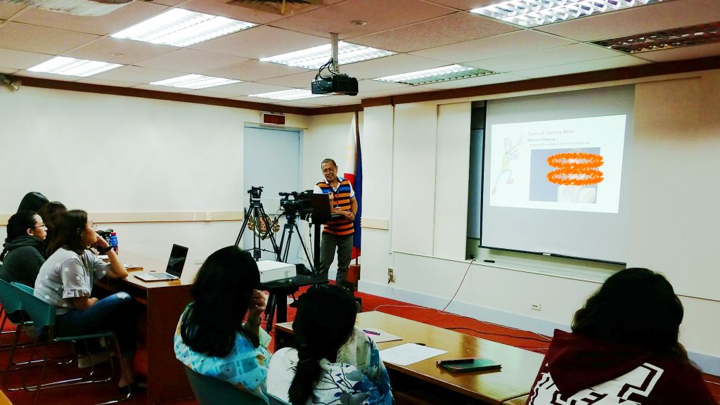 Mr. Alejandro Zamora teaching the participants about the different camera shots. Mr. Alejandro Zamora teaching the participants about the different camera shots
