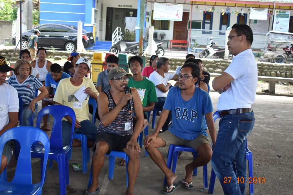 Dr. Yusuf Sucol (right), University Coordinator of UP Los Baños Climate and Disaster Risks Studies Center served as the resource speaker for the Orientation Seminar on Disaster Risk Reduction and Management organized by the Ugnayan ng Pahinungod UPOU on 27 October 2019 at Brgy. Tagumpay, Bay, Laguna.
