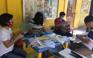Face shields and face masks prepared by EVSU-Ormoc City faculty and staff were distributed to the market vendors in Ormoc City. (Images provided by Ms. Georgina Orbeta)