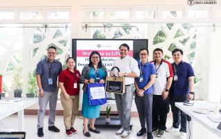 Director Ria Valerie Cabanes from UPOU QAO and Director Allan Paul Tang of the LEAD Center at Miriam College (center) with UPOU and LEAD Center personnel.
