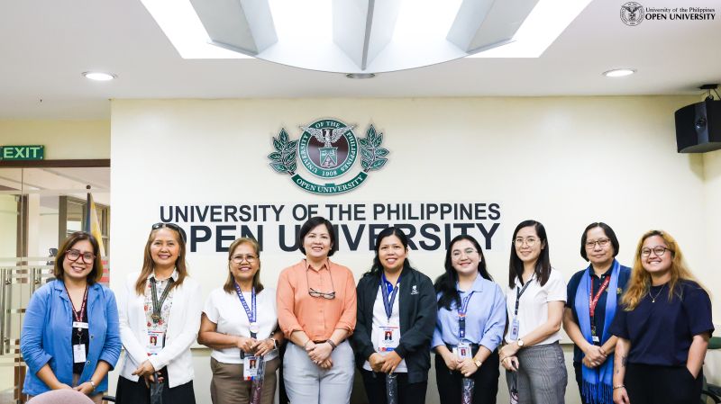 UPOU Chancellor Joane V. Serrano (fourth from left) and UPOU FMDS Dean Finaflor Taylan (leftmost) with the representatives from DSWD Capability Building and Knowledge Management Divisions and UPOU staff members.