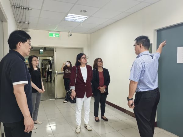 Dr. Su (far right) shows Dr. Serrano and Dr. Taylan the proposed office of the International University Social Responsibility (IUSR) and learning hub for OFWs.