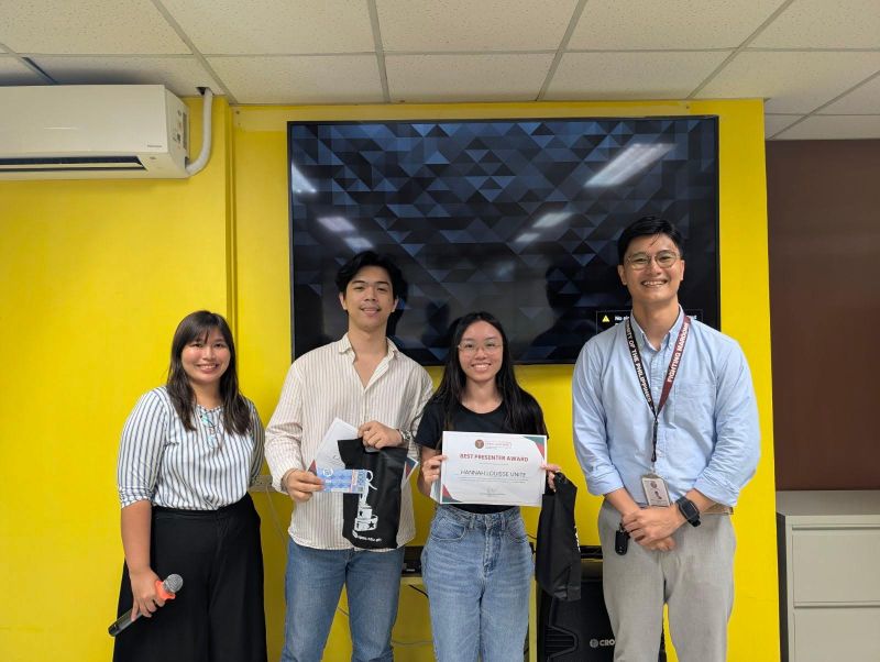 Hannah Louisse Unite and E.J. Paolo Magpantay receive the Best Presenter Award for their outstanding performance during the final presentation of the Midyear 2025 ICTDO Internship Program.