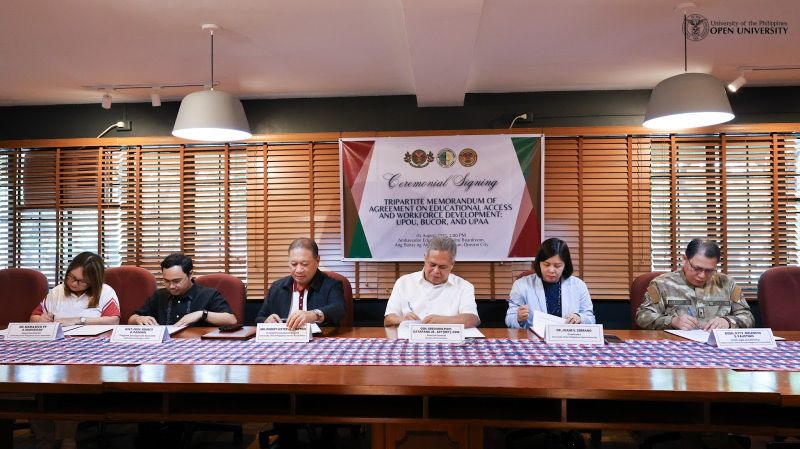 Official signatories signing the Memorandum of Agreement