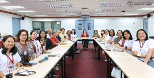 UPOU Chancellor Joane Serrano (center) with members of the UPOU Administration, the All UP Workers Union - UPOU Chapter (left) and the All UP Academic Employees Union - UPOU Chapter (right).