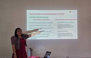 Asst. Prof. Cabanes discusses the key concepts on microcredential courses during the orientation (Photo from UPDEPPO)