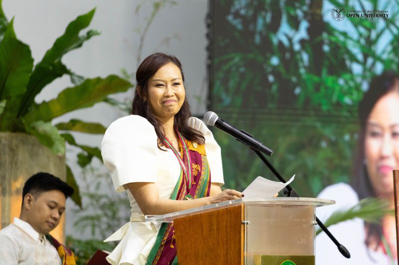 Ms. Kia Obang delivers the message as the representative of the graduating class.