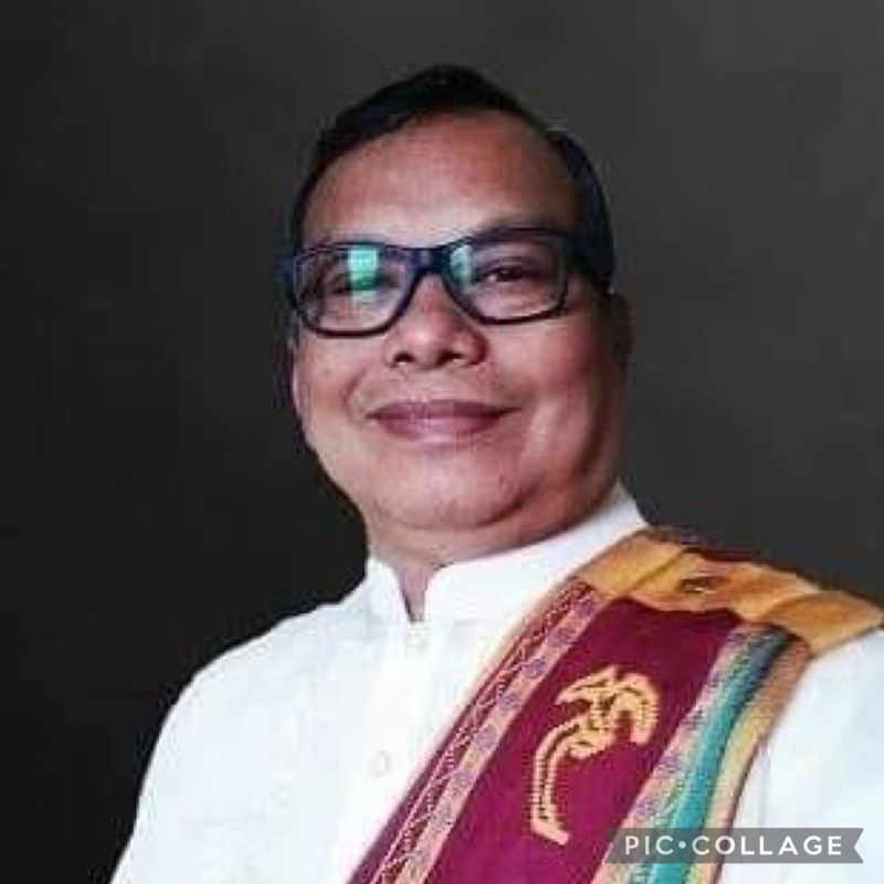 Ray donning the UP sablay.