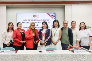 UPOU Chancellor Joane Serrano (center), with (L–R): Ms. Lovelyn Petrasanta, Dr. Fuvie Roja-Bayot, Dr. Berhana Flores, Dr. Juvy Lizette Gervacio, Dr. Benigno Agapito Jr., Ms. Eleanor P. Manipol, and Ma’am Carmelita A. Orias.