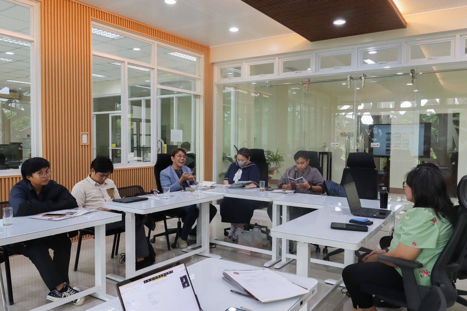 Officials from Tarlac State University met with Dir. Ria Valerie Cabanes during benchmarking at UPOU Headquarters