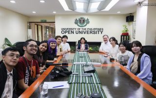 Chancellor Joane Serrano (center) with Roberto Figueroa, Jr. (fifth from left), Takayuki Konno (sixth from left), Eric Hawkinson (right), and students from the University of the Philippines Open University and Meisei University.