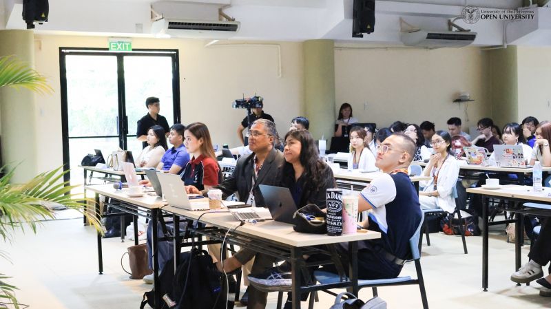Seated in front are the panel of judges namely, (L-R) Ms. Rutchelle Ann Quiblat, Asst. Prof. Ari Luis Halos,, Ms. Julieta Gonzalez-Torres, and Asst. Prof. Edmerson Calungsod.