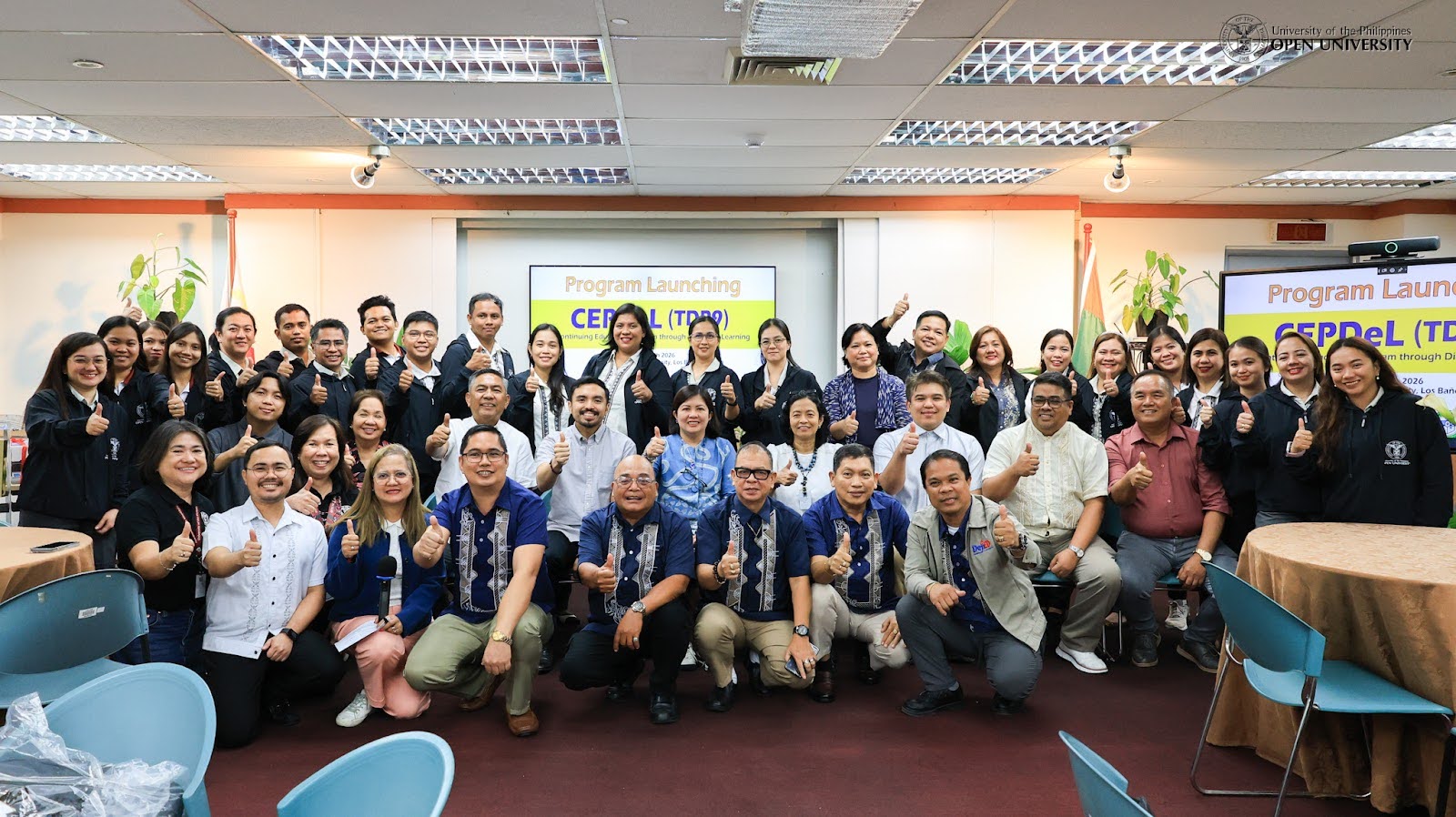 UPOU officials with representatives from the Department of Education – Quezon, the Local Government Unit (LGU) of Mauban, Quezon Power Limited (QPL), UPOU Foundation Inc. (UPOUFI), and the teacher-scholars.