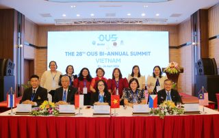UPOU delegates (standing) with the leader of OU5 member agencies (seated).