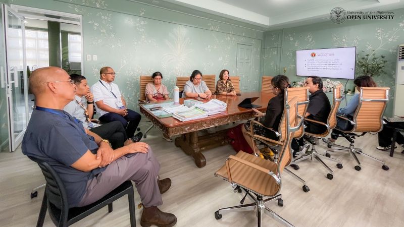 Naga City officials listen to Asst. Prof. Remsce Pasahol’s presentation of UPOU’s academic offerings.