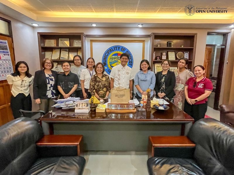 UPOU officials with Mayor Tomas Bocago (center) of Sipocot, Camarines Sur.