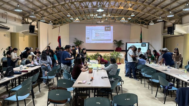 Participants engage in a collaborative exercise during the CSW session, using problem tree analysis to identify the causes and effects of workplace challenges and determine underlying root causes.