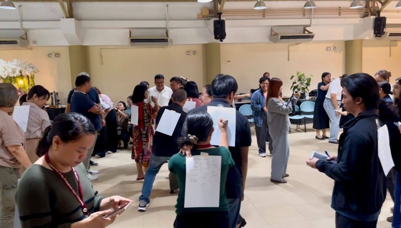 Participants engage in collaborative activities during the ROSES session.