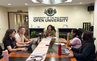 UPOU Chancellor Joane V. Serrano leads the inaugural meeting of the Dagitab Digital Transformation Committee on 28 July 2026, as members discuss e-spasyOU and other priority initiatives under the University's digital transformation agenda.