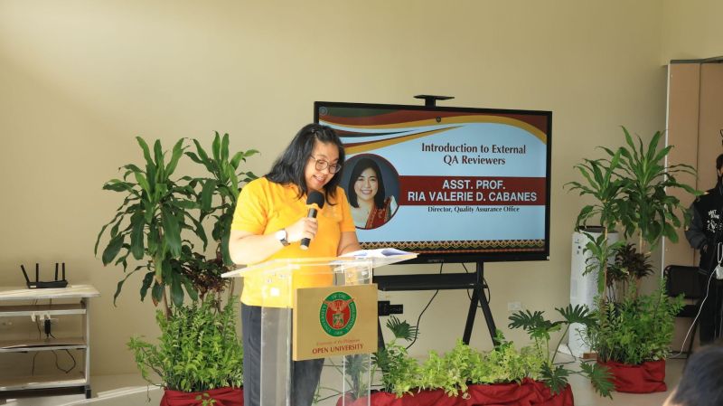 Asst. Prof. Ria Valerie D. Cabanes, QAO Director, introduces the reviewers during the opening ceremony of the 6th External Quality Review.