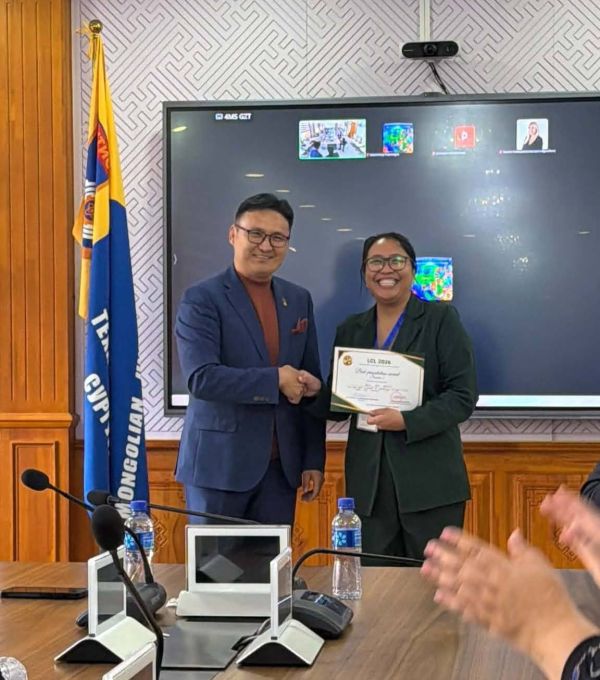 Asst. Prof. Regine Karla Bagalanon receives the Best Presentation Award for Session 1 for her paper, “Caring Cannot be Prompted: An Autoethnography of Becoming a Nurse Educator in an AI-Enabled ODeL Environment.” She is pictured with MUST Vice President for Development Policy and Digital Transformation Prof. Dr. Badmaanyambuu Ranjil.